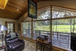 Living room with view of 12th green